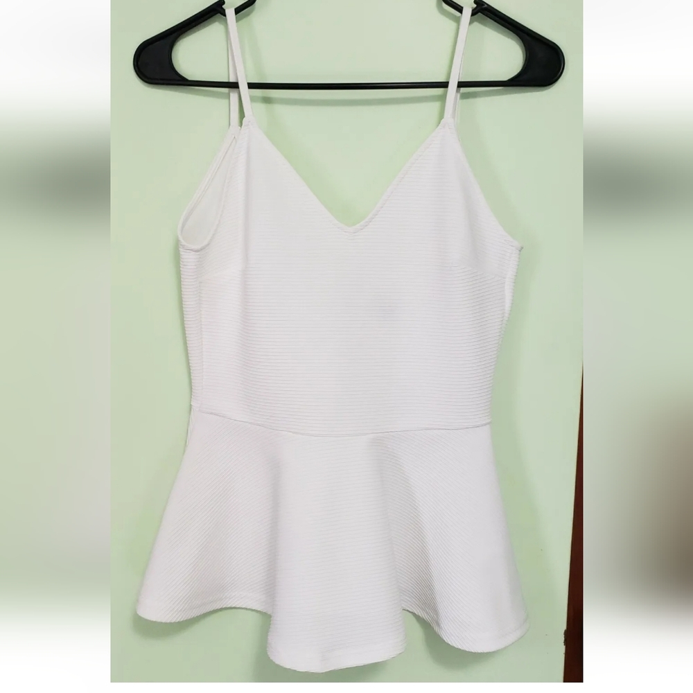 Divided White V Neck Peplum Top